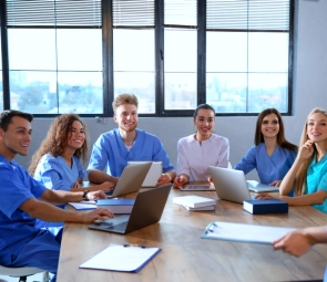 A group of health staffs discussing on a table