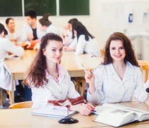 Three health workers smiling together