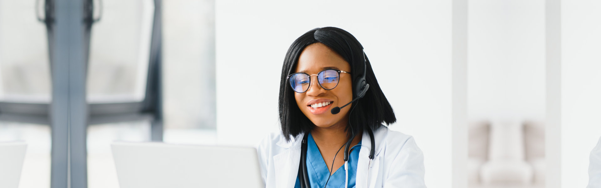 a female healthcare staff wearing headphone