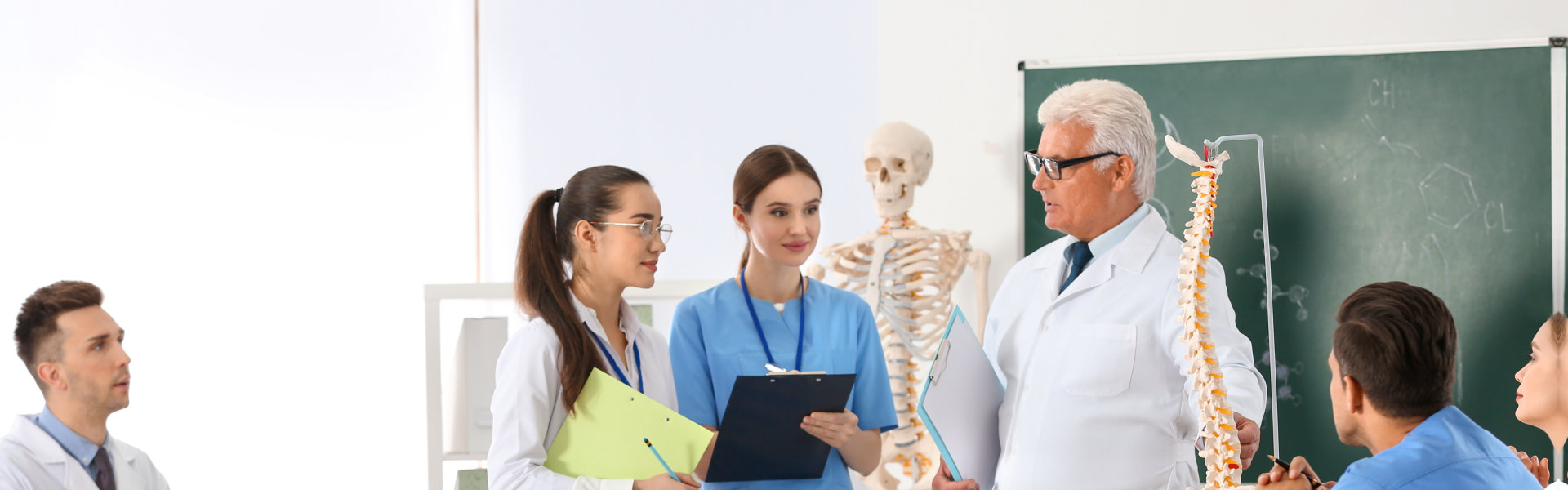 A male doctor teaching a class